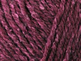 Close up on burgundy ball of Elsebeth Lavold Silky Wool XL yarn. 