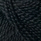 Close up on a ball of black Jo Sharp Alpaca Kid Lustre yarn. 