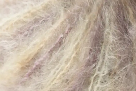 Close up of cream and pink Jo Sharp mohair yarn. 