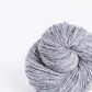 Heathered gray ball of Brooklyn Tweed Loft yarn. 