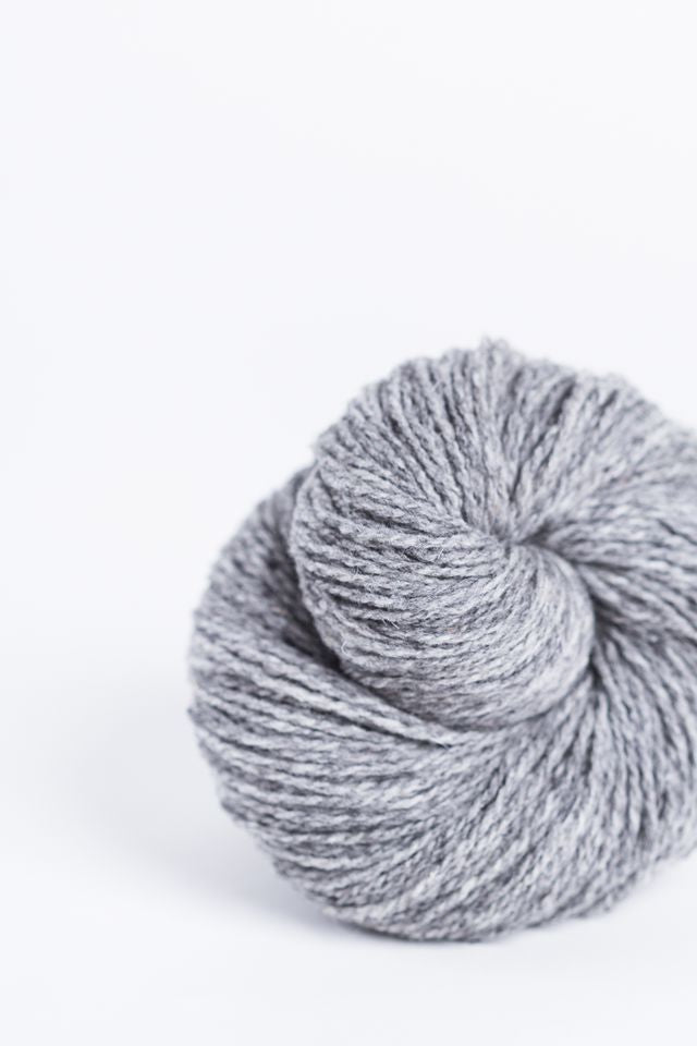 Heathered gray ball of Brooklyn Tweed Loft yarn. 