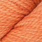 Close up on skein of Berroco Ultra Alpaca Chunky yarn in orange. 