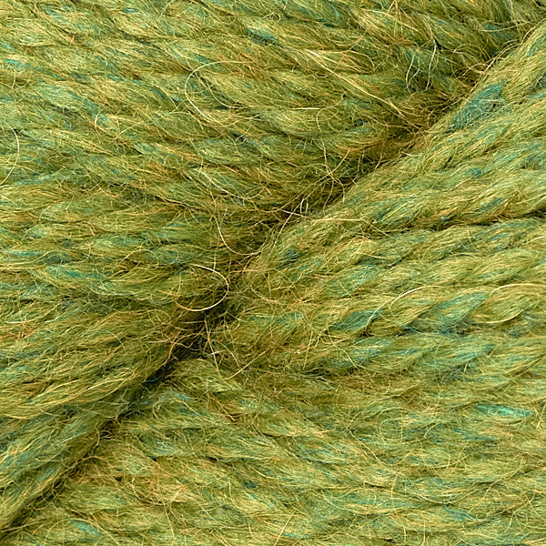 Close up on skein of Berroco Ultra Alpaca Chunky yarn in moss green. 