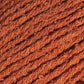 Close-up image of bambouclé yarn from Elsebeth Lavold in burnt orange.