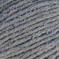 Close-up image of bambouclé yarn from Elsebeth Lavold in soft grey.