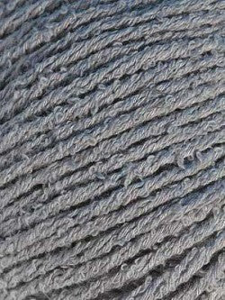 Close-up image of bambouclé yarn from Elsebeth Lavold in soft grey.