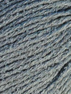 Close-up image of bambouclé yarn from Elsebeth Lavold in dusty blue.