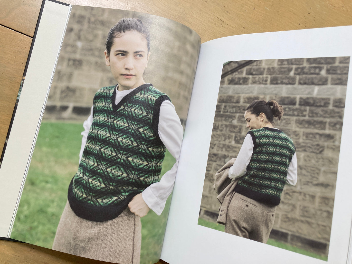 Yuco Sakamoto’s My Fair Isle Journey book, lying open to a photo of people wearing colorful fair isle garments. 