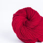 Skein of bright red Brooklyn Tweed Arbor yarn in color Alizarin - Hillsborough Yarn Shop - Hillsborough, NC, USA