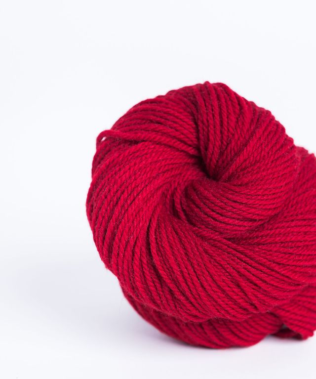 Skein of bright red Brooklyn Tweed Arbor yarn in color Alizarin - Hillsborough Yarn Shop - Hillsborough, NC, USA