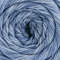 Close up on a semisolid ball of denim blue Cascade Botanika yarn. 