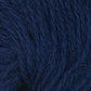 Close up on ball of navy blue Plymouth Angora yarn. 