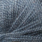 Close up on a ball of denim blue Jo Sharp Alpaca Kid Lustre yarn. 