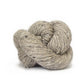 Skein of pale beige Kelbourne Woolens Lucky Tweed yarn. 