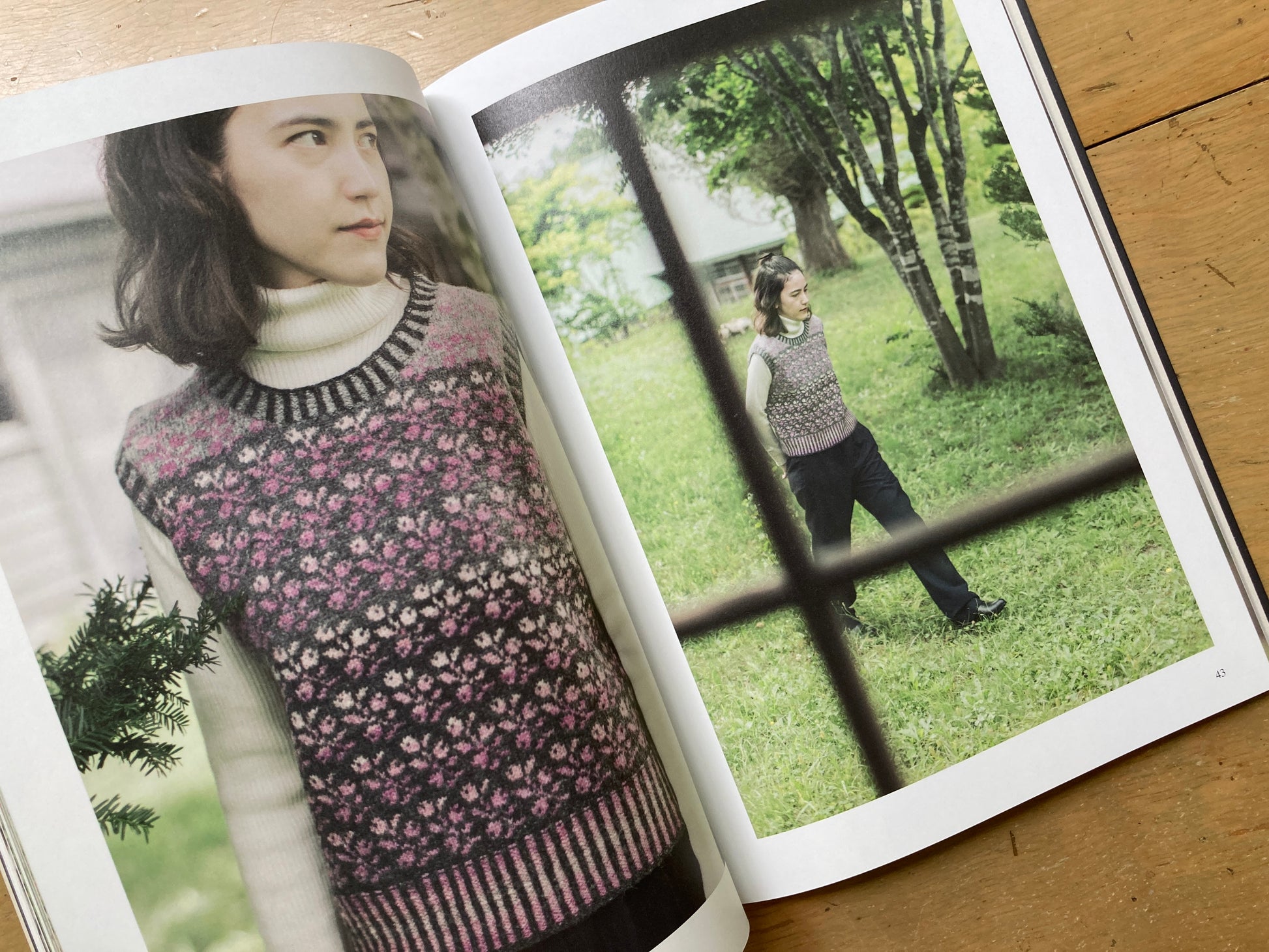 Yuco Sakamoto’s My Fair Isle Journey book, lying open to a photo of people wearing colorful fair isle garments. 