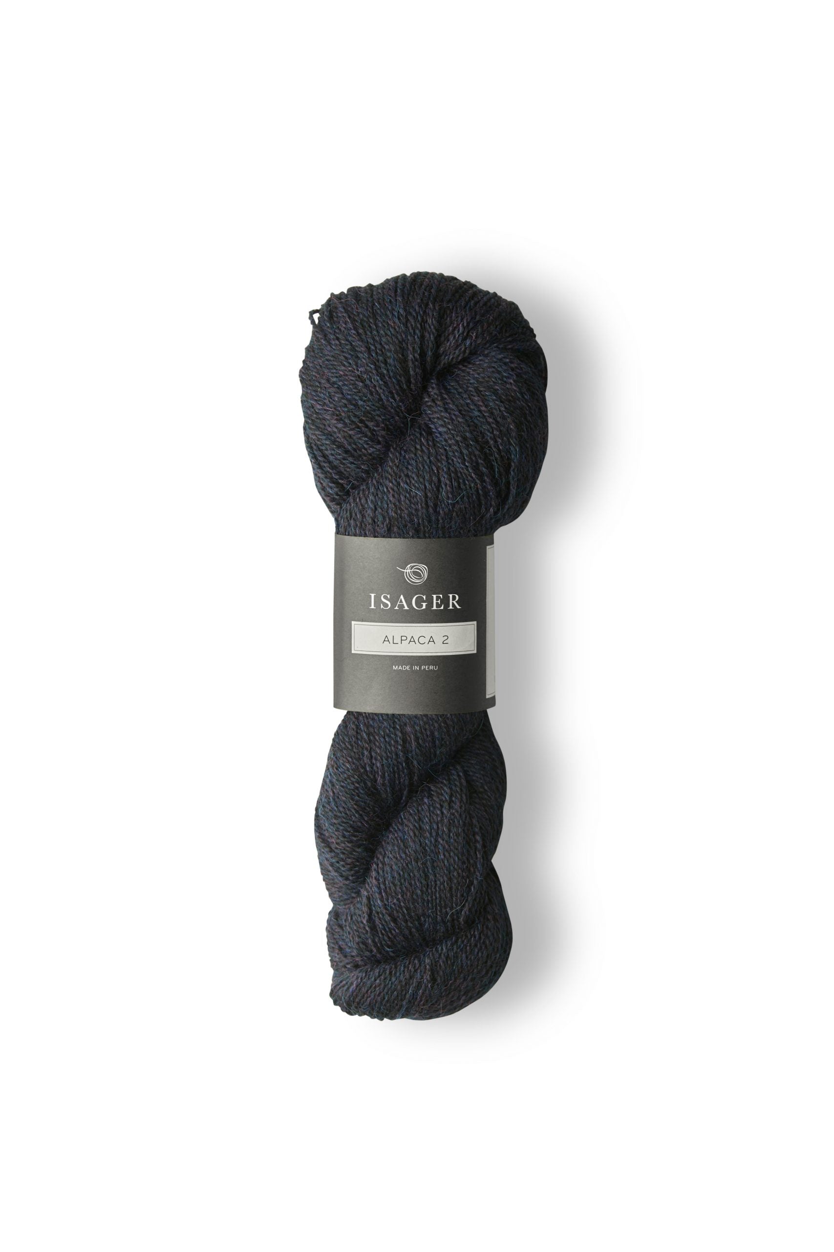 Skein of dark blue Isager Alpaca 2 yarn in color midnight. 