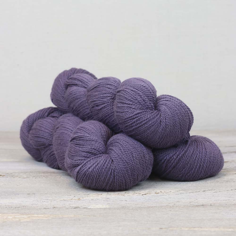 3 skeins of purple Fibre Co. Amble yarn. 