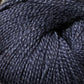 Close up on a ball of dark blue Jo Sharp Alpaca Kid Lustre yarn. 