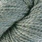 Close up on skein of Berroco Ultra Alpaca Chunky yarn in 72188 Lunar Mix, a heathered gray green