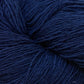 Close up on a navy blue skein of Briggs & Little Sport yarn. 