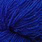 Close up on a bright cobalt blue skein of Briggs & Little Sport yarn. 