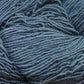 Close up on a blue gray skein of Briggs & Little Sport yarn. 