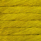 Skein of semisolid mustard yellow Malabrigo Caprino yarn. 