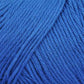 Close up on a lapis blue skein of Brown Sheep Cotton Fleece yarn. 