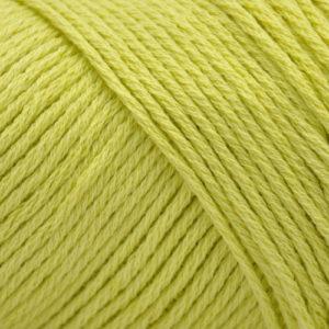 Close up on an acid green skein of Brown Sheep Cotton Fleece yarn. 