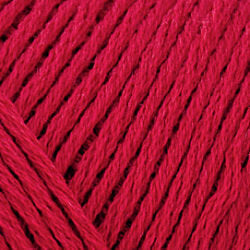 Close up on a red skein of Brown Sheep Cotton Fleece yarn. 