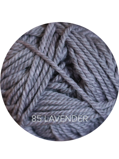 Close up on a lavender gray ball of Ewe Ewe Heather’s Heathers yarn. 