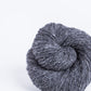 Dark gray ball of Brooklyn Tweed Loft yarn. 