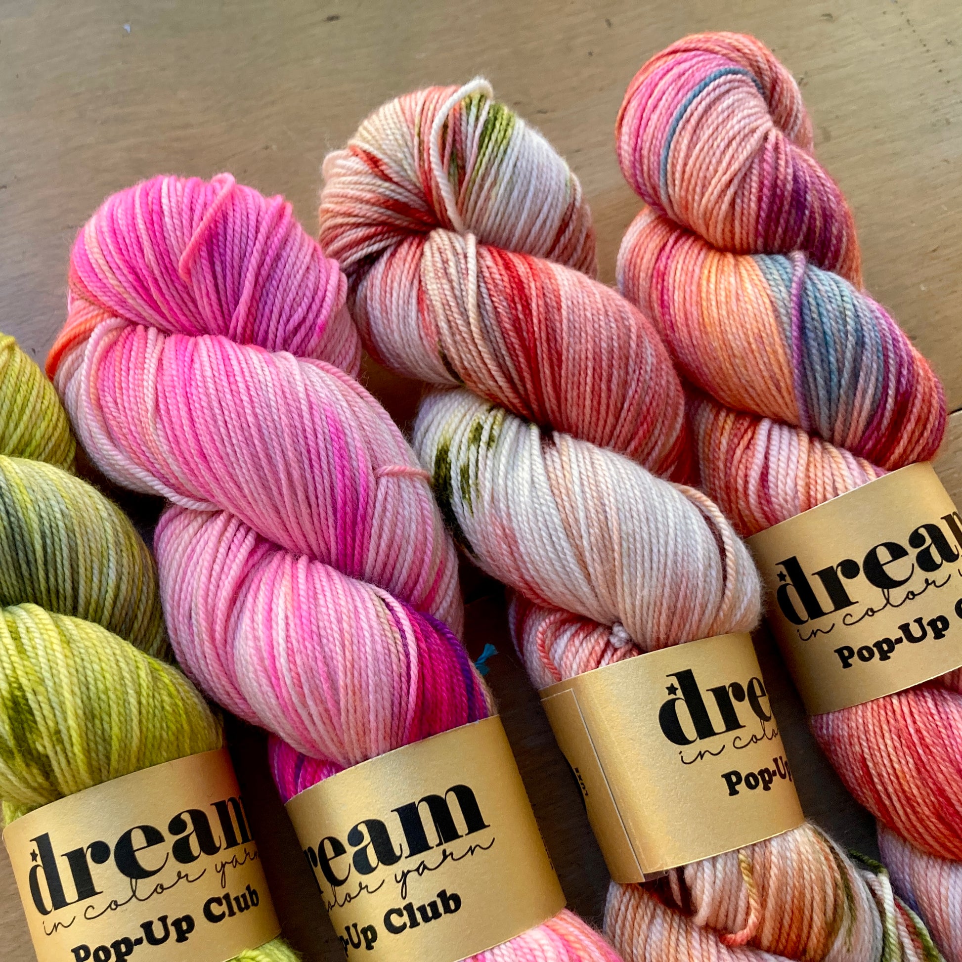 Colorful variegated skeins of Dream in Color Smooshy Cashmere yarn on display at Hillsborough Yarn Shop