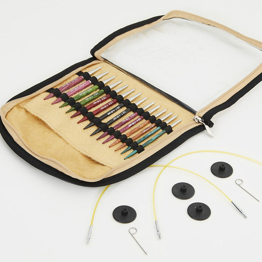 Unzipped clear plastic case of colorful interchangeable knitting needles. 