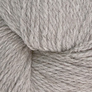 Close up on a skein of heathered gray Cascade Ecological Wool yarn. 