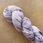 Speckled cream and purple Fleece Artist / Hand Maiden yarn, colorway Blueberry Muffin 