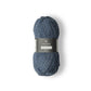 Denim blue ball of Isager Highland Wool yarn. 