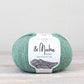 Mint green ball of Fibre Co. & Make Aran yarn. 