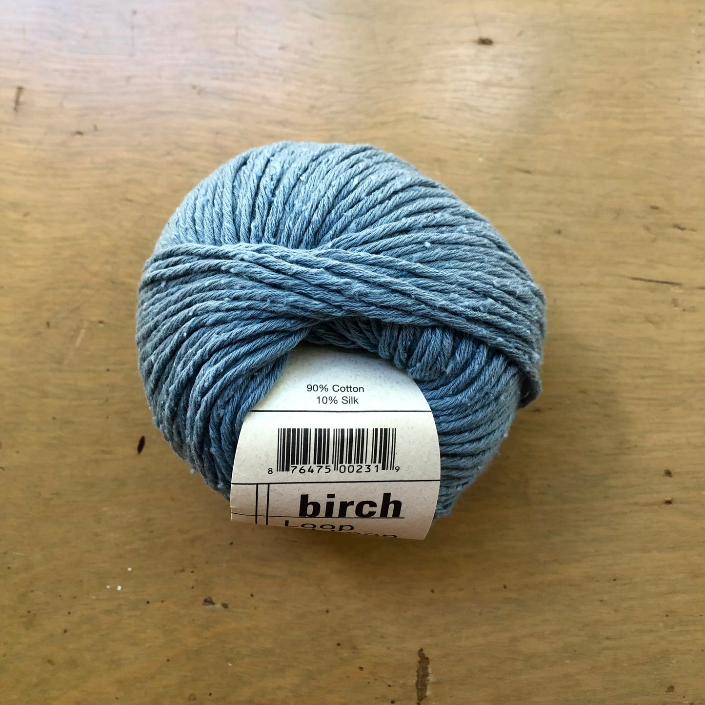 Medium blue ball of Birch yarn, from Loop-d-Loop by Teva Durham. 