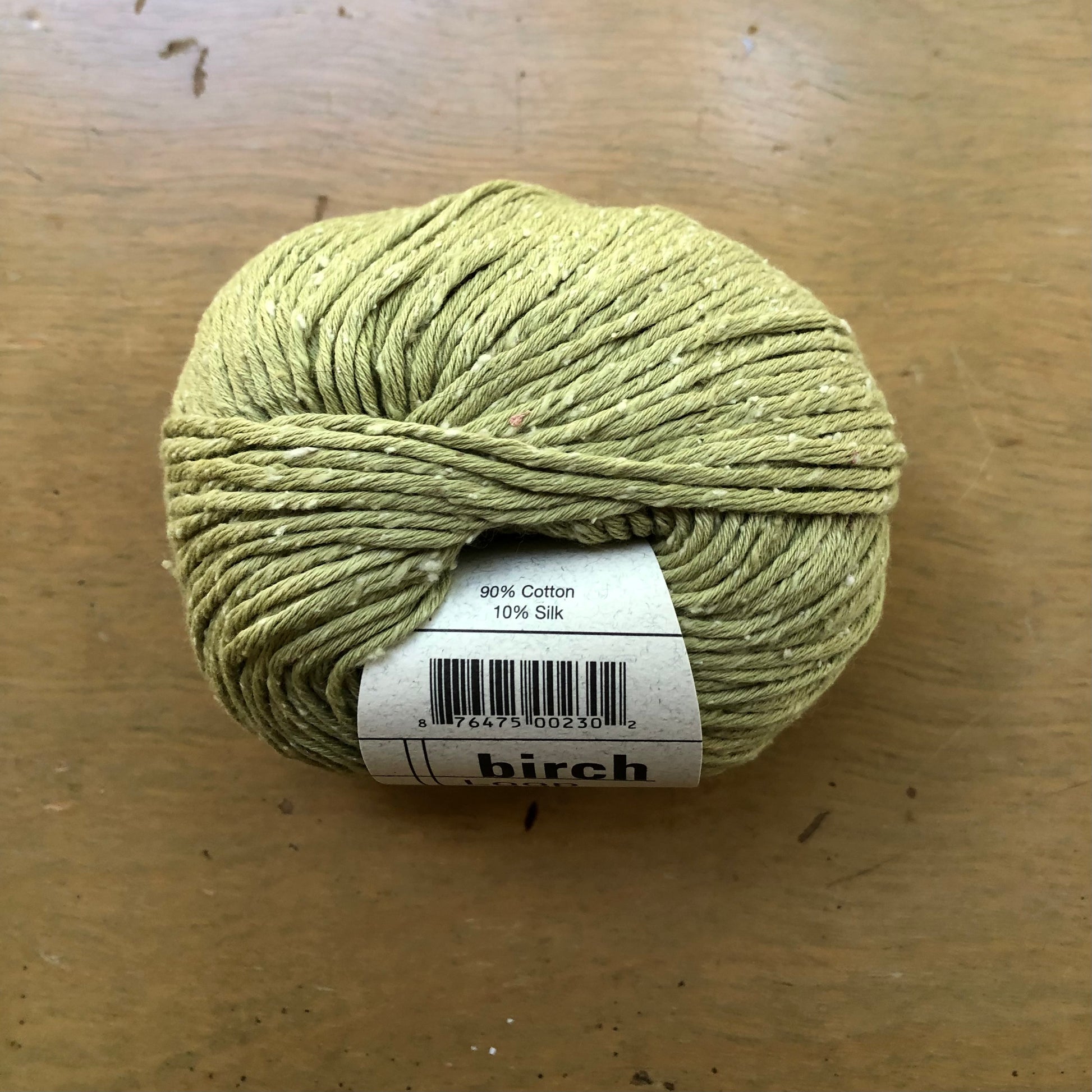 Grass green ball of Birch yarn, from Loop-d-Loop by Teva Durham. 