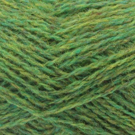 Heathered bright green, cool toned, with flecks of yellow - Jamieson's Shetland Spindrift yarn in Leprechaun.