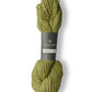 Heathered chartreuse skein of Isager Jensen yarn. 