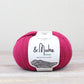 Magenta ball of Fibre Co. & Make Aran yarn. 