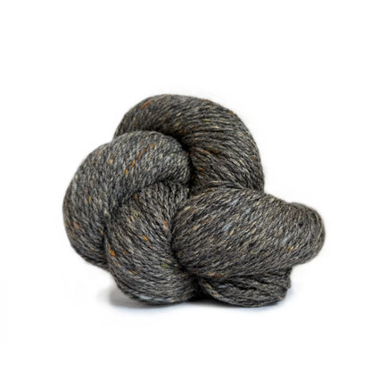 Skein of gray brown Kelbourne Woolens Lucky Tweed yarn, colorway Basalt