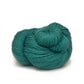 Close-up of a skein of teal green Perennial yarn by Kelbourne Woolens.