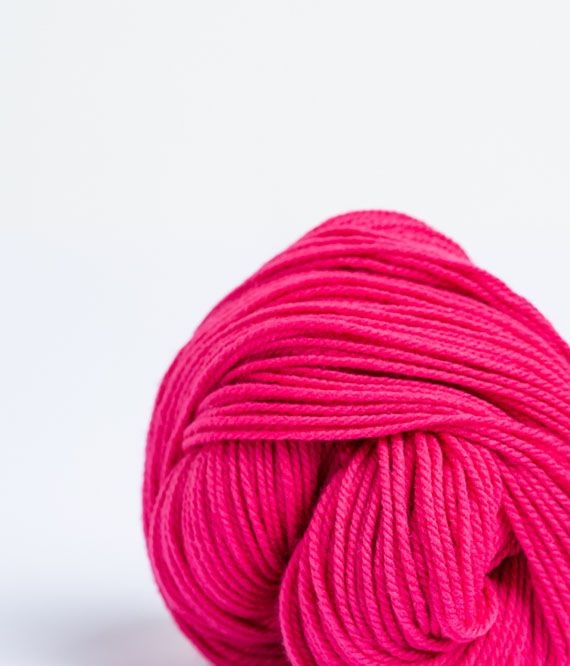 Skein of fucsia Brooklyn Tweed Arbor yarn in color Azalea - Hillsborough Yarn Shop - Hillsborough, NC, USA