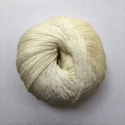 Ball of Lana Grossa Biosoja yarn in a cream/yellow color. 