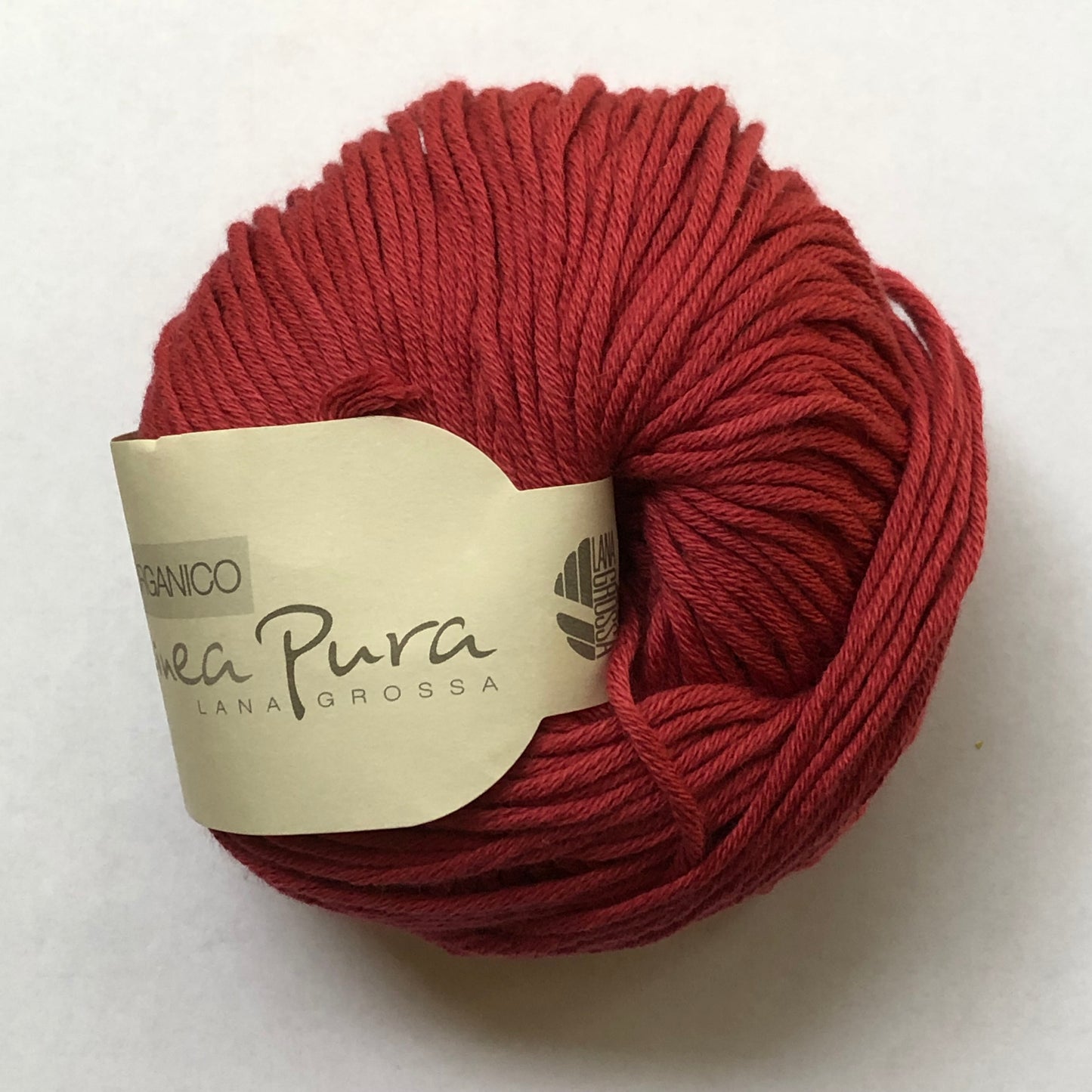 Ball of Lana Grossa Organico cotton yarn in red