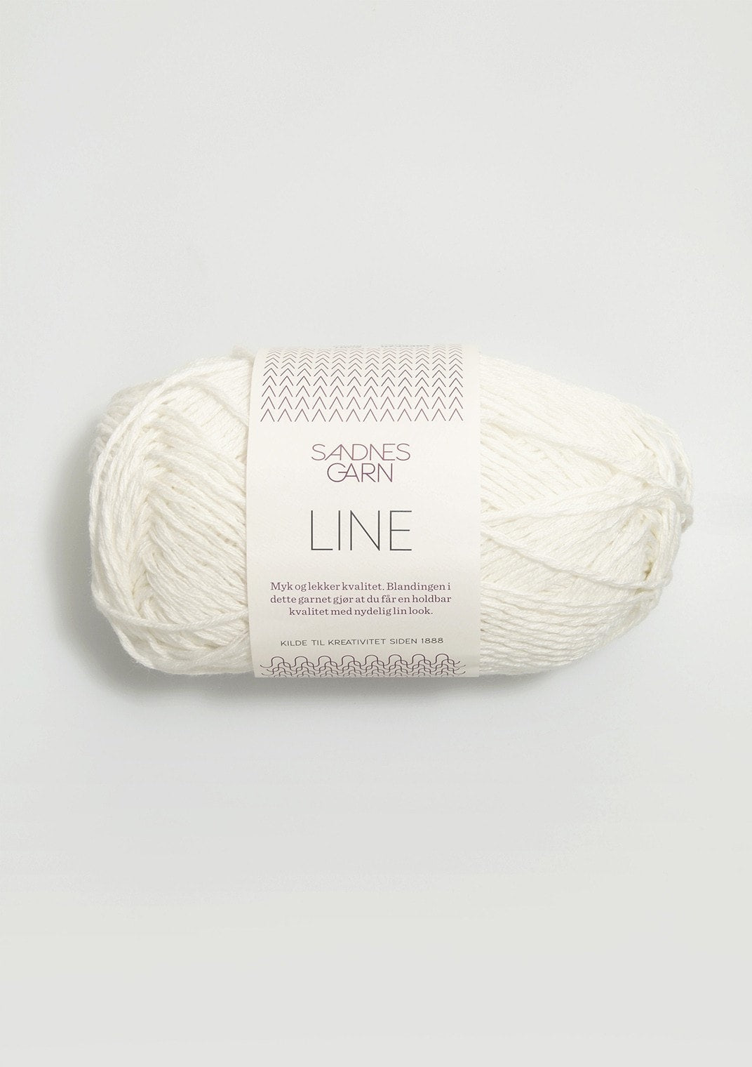 Off white ball of Sandnes Garn Line yarn. 