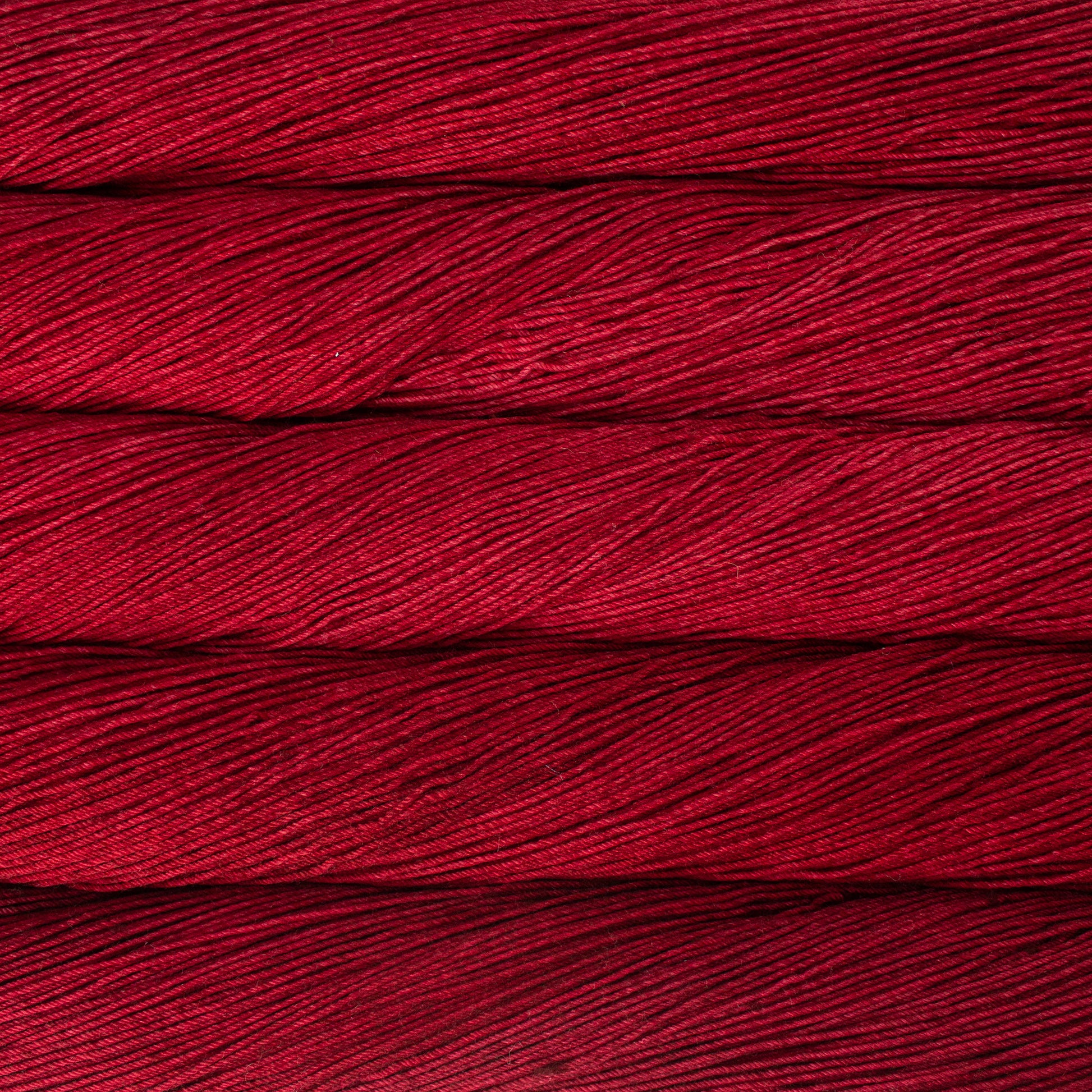 Variegated skeins of red yarn - Ultimate Sock by Malabrigo 